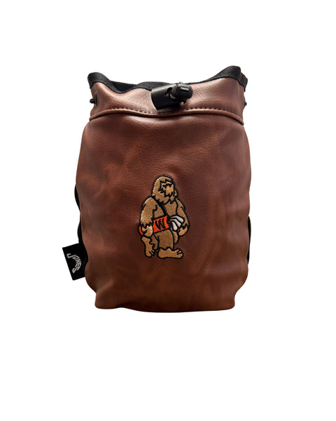 Brown leather pouch with embroidered Wildwood logo on a white background